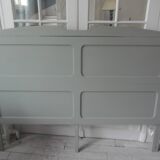 Headboard for a 160 bed made with old elements, enhanced in verdigris.