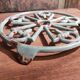 Vintage French light greenish blue cast iron table mat