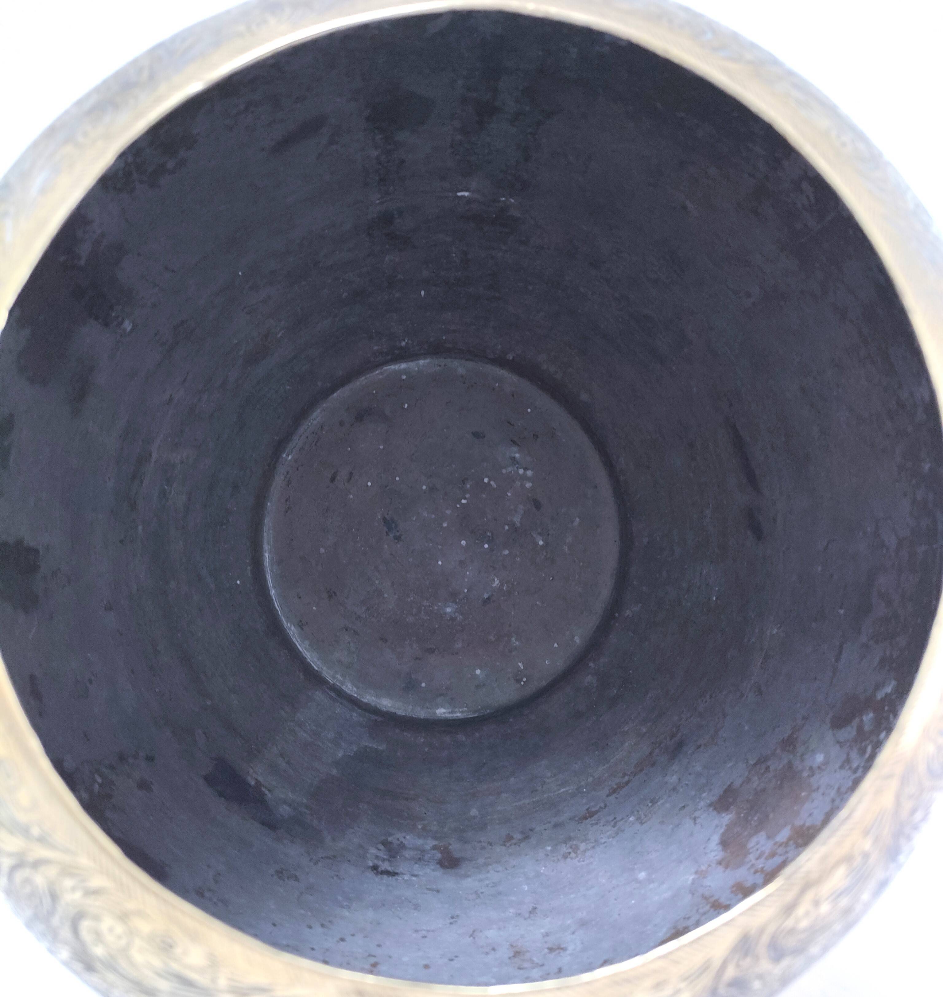 Solid brass pot cover engraved with animal, plant and character decoration