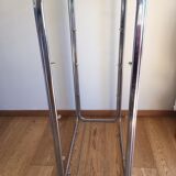 Chrome shelves and smoked glasses design