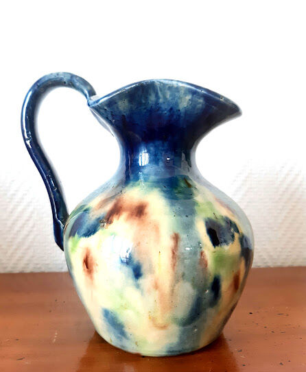 Set of art nouveau ceramic pitchers