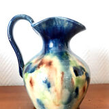 Set of art nouveau ceramic pitchers