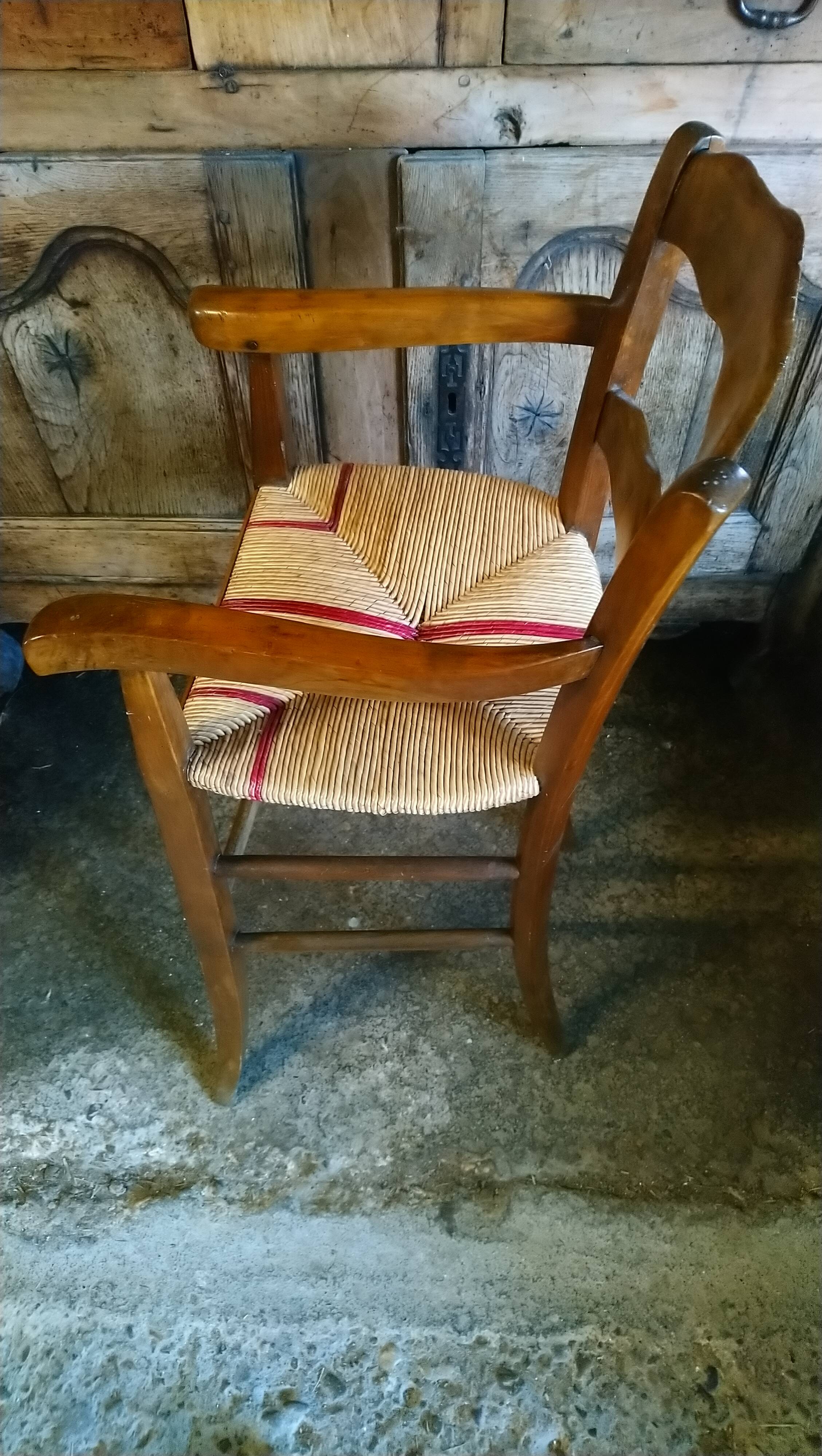 Child's high chair with a rush seat in walnut