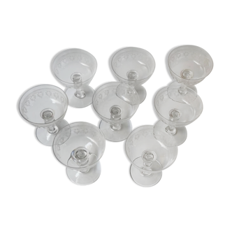 Crystal champagne glasses decorated with interlacing