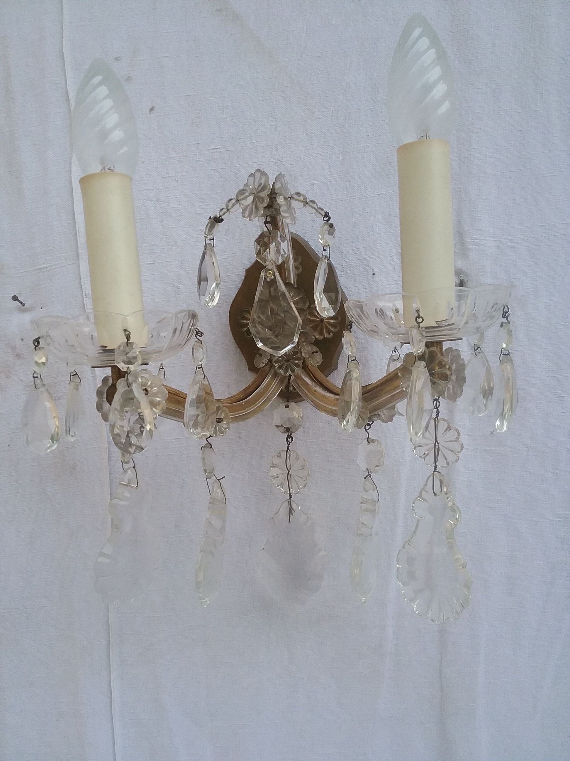 Pair of stamped wall light