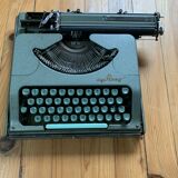 M.J. Rooy light green typewriter