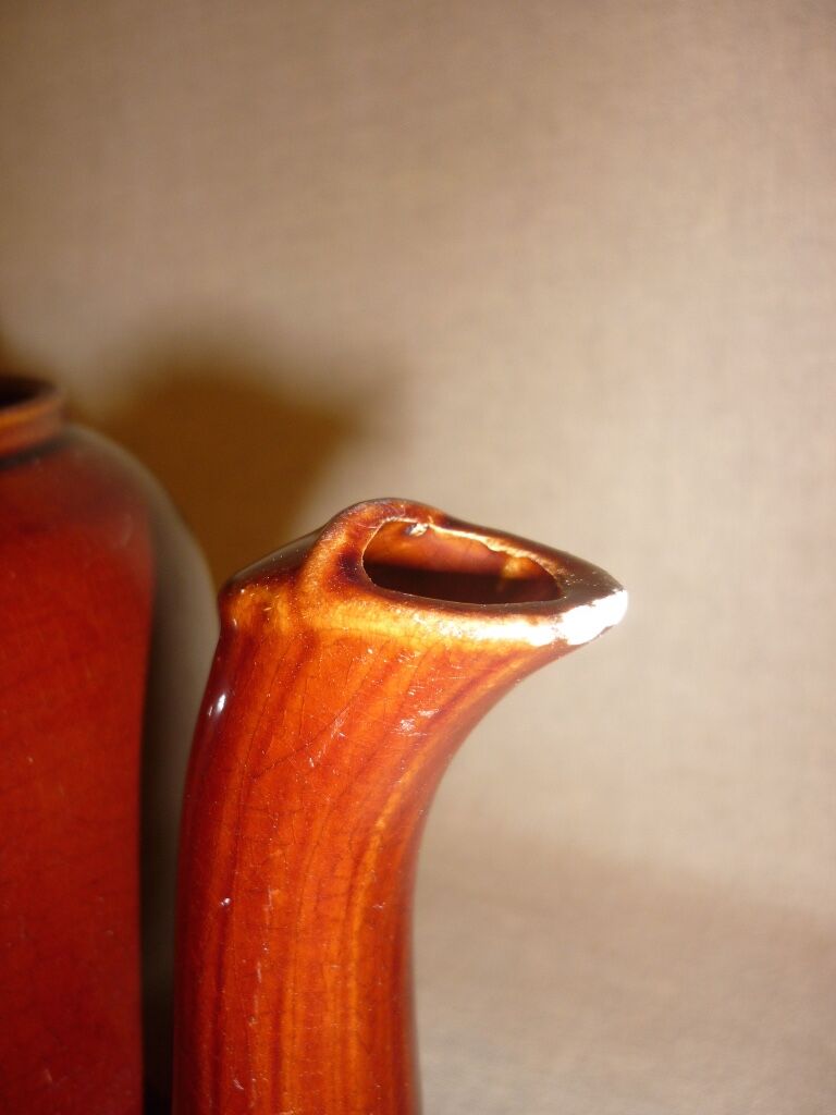 Very large brown ceramic coffee maker