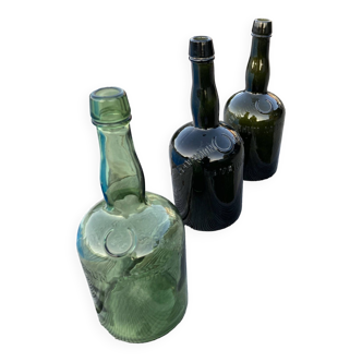 Set of three Vintage Rum Bottles