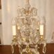 Four-candle girandole in bronze and crystal, early 20th century.