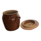 Ancient ceramic salt cellar and its lid.
