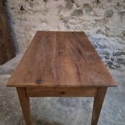 French antique dining table in cherry wood with two drawers, circa 1880–1920.