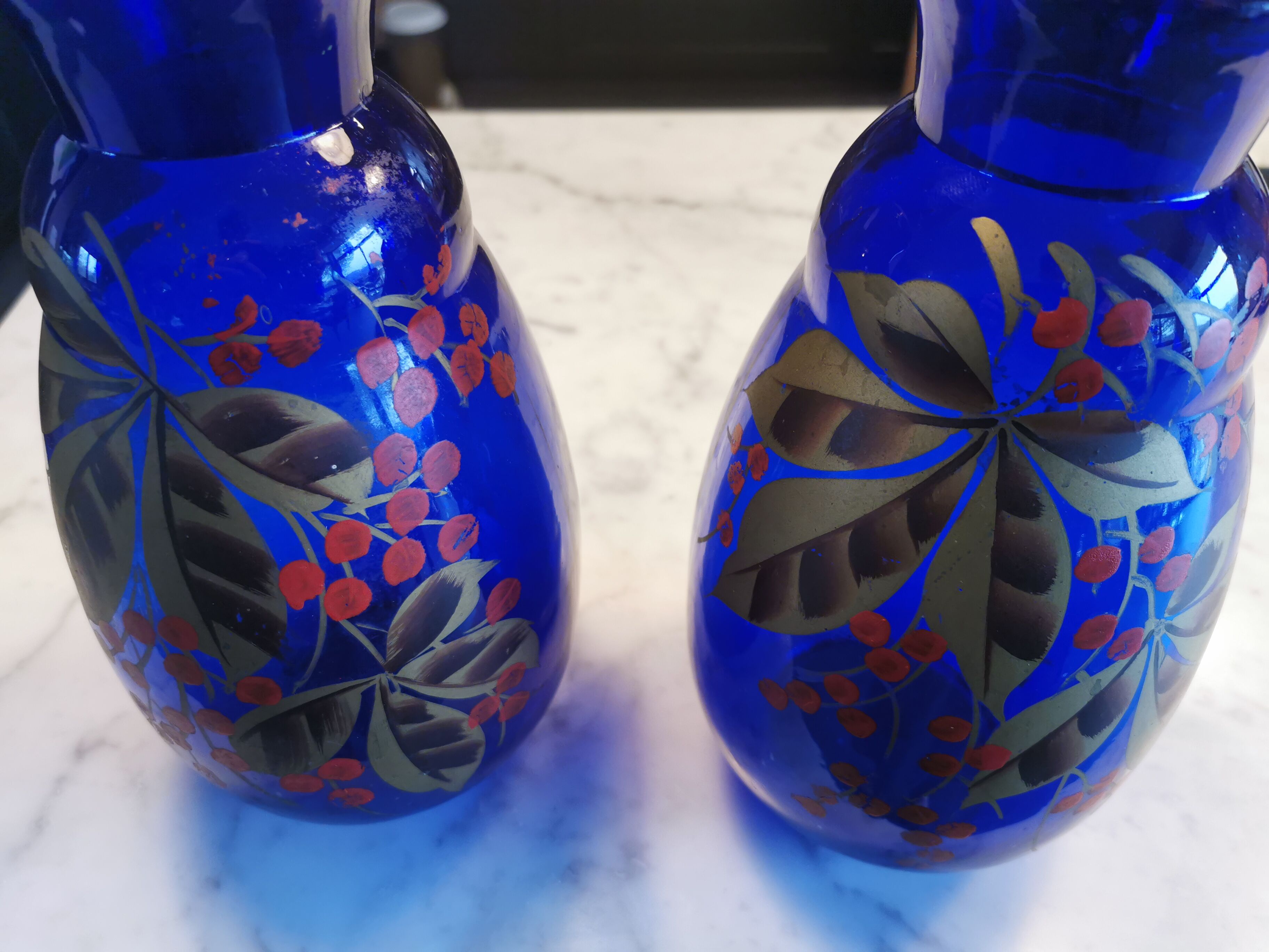 Pair of old blue painted glass vases