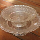 Duo of molded glass display cups, arabesque décor