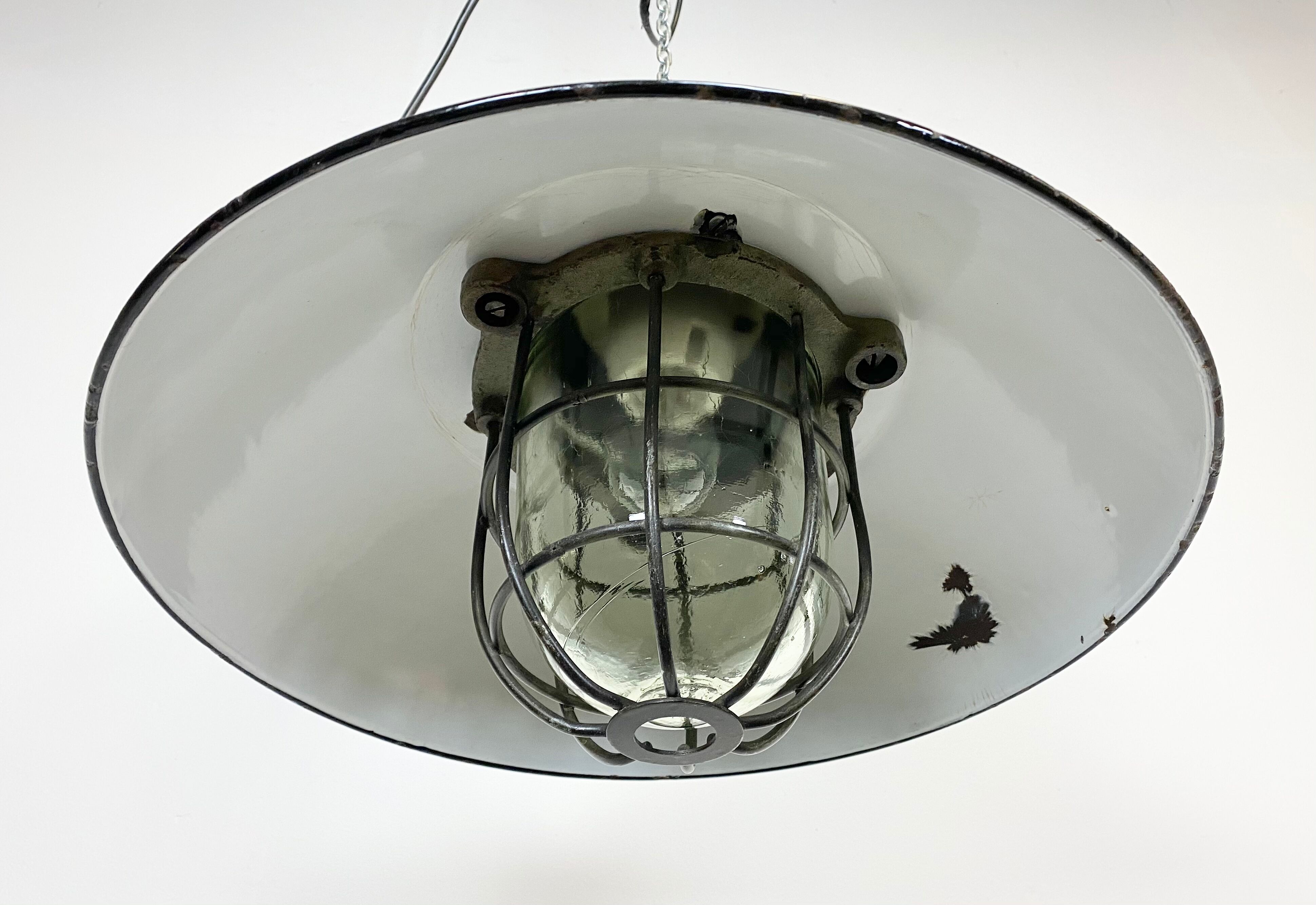 Black enamel and cast iron industrial cage pendant lamp, 1950