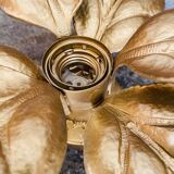 Gold metal flower wall light