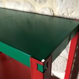 Shelf on multi-colored metal feet