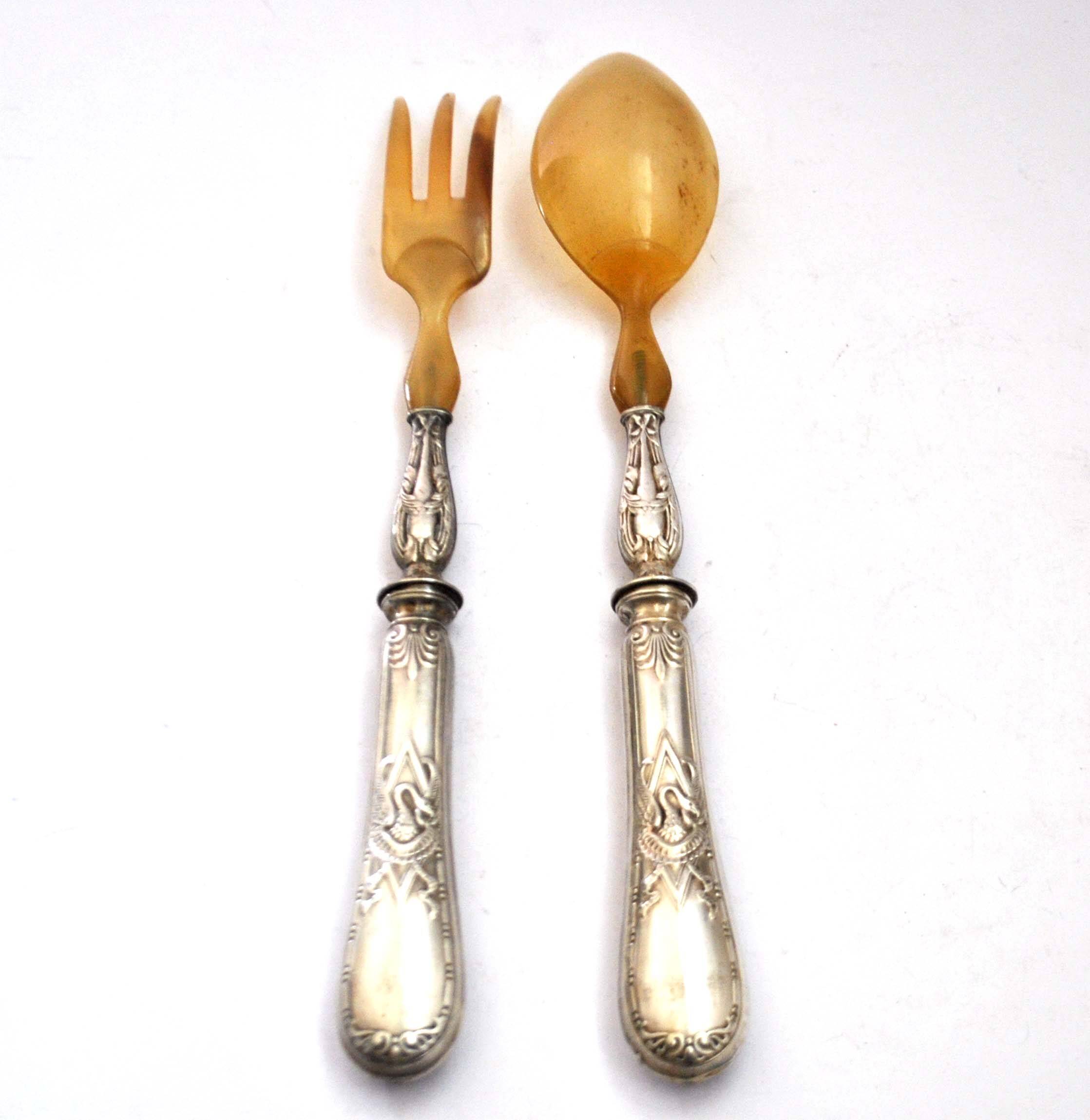 Empire salad server decorated with a swan and napoleon palmette, 19th century.