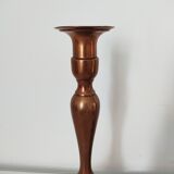 Set of a pair of candle holders and a hand candle holder