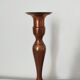 Set of a pair of candle holders and a hand candle holder