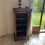 Small glass-fronted accent cabinet in cherry wood.