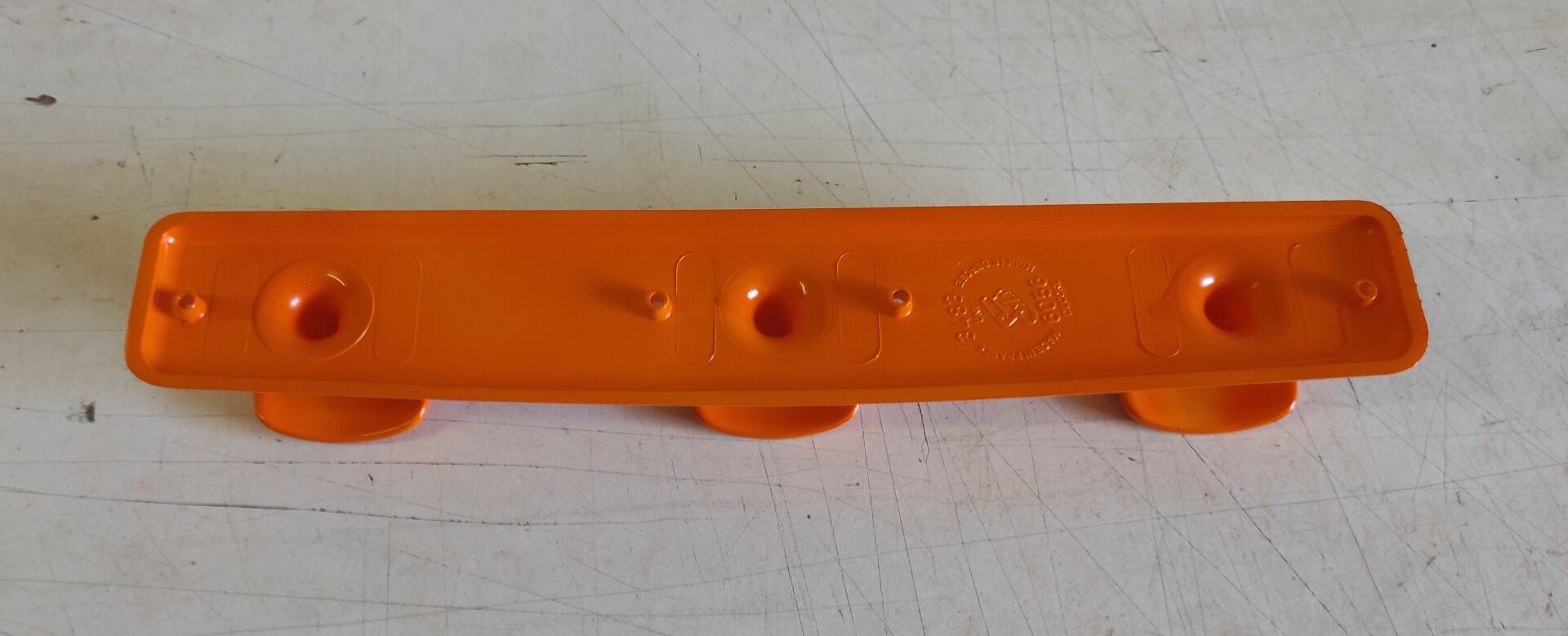Orange wall coat rack by Syla - 1970s