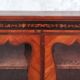 Louis XVI glass-fronted library in rosewood and amaranth veneer.