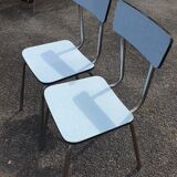 2 sky blue Formica chairs