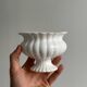 Small white ceramic flowerpot or bowl on foot