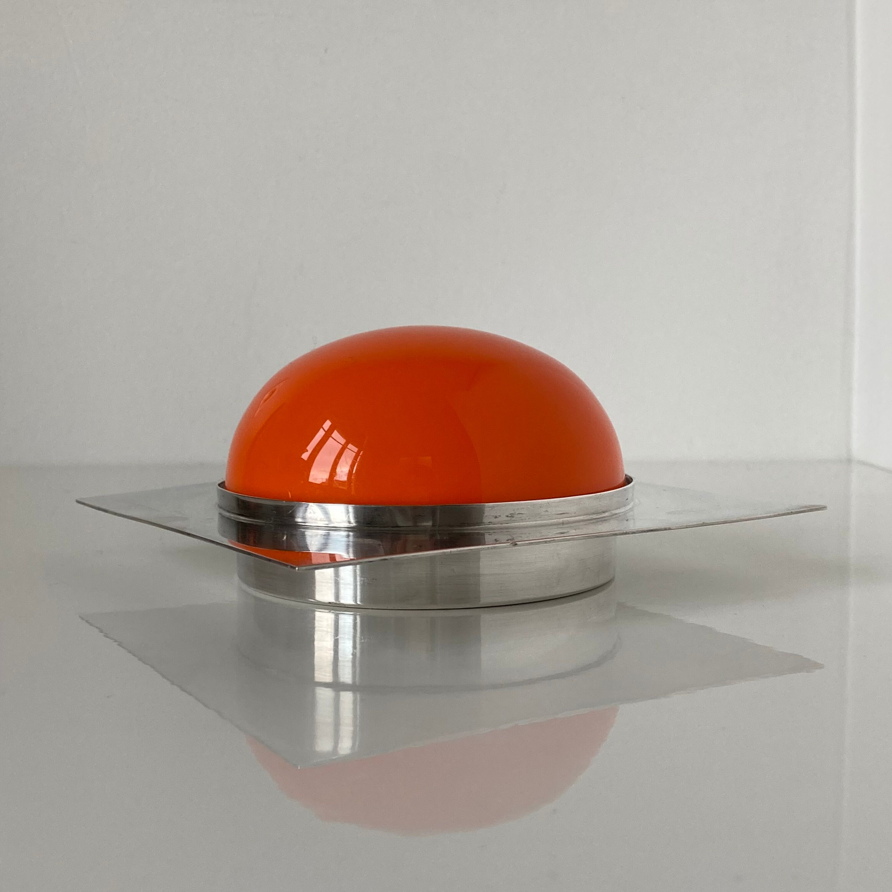 Box covered in silver metal and orange ABS by Lino Sabattini for Gallia by Christofle