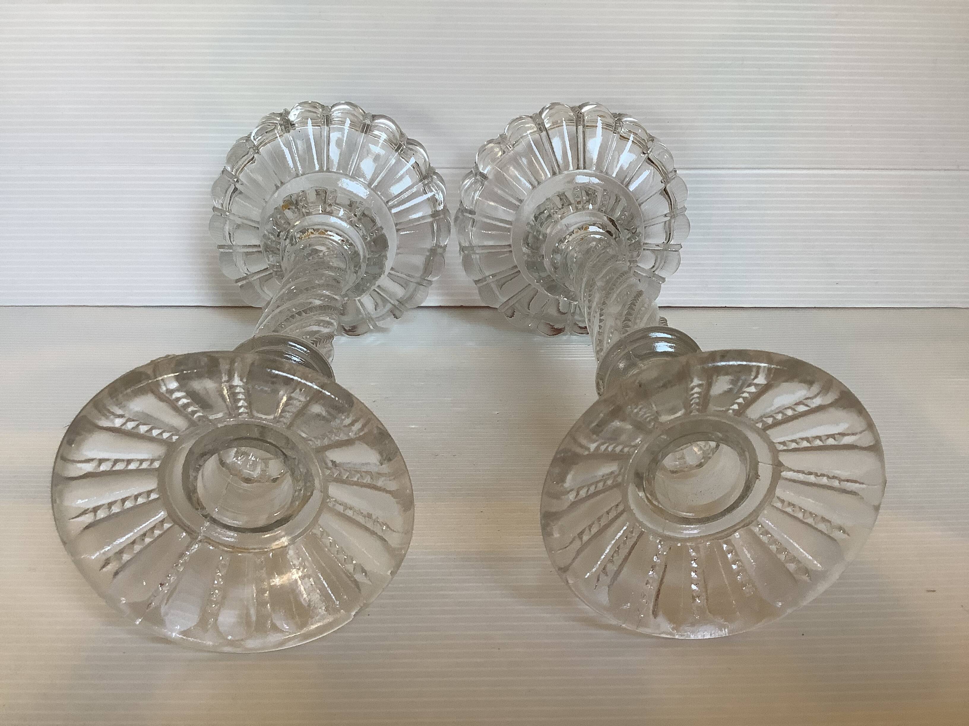 Pair of old twisted candlesticks with diamond tips.