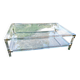 Coffee table in plexiglass and brass.