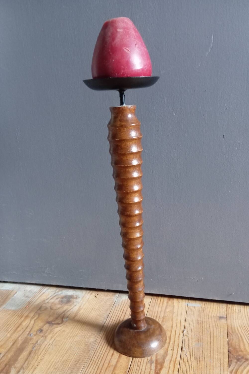 Vintage turned wooden candle holder, black metal candle base