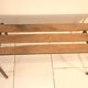 Old bench wooden slats and tubular metal base
