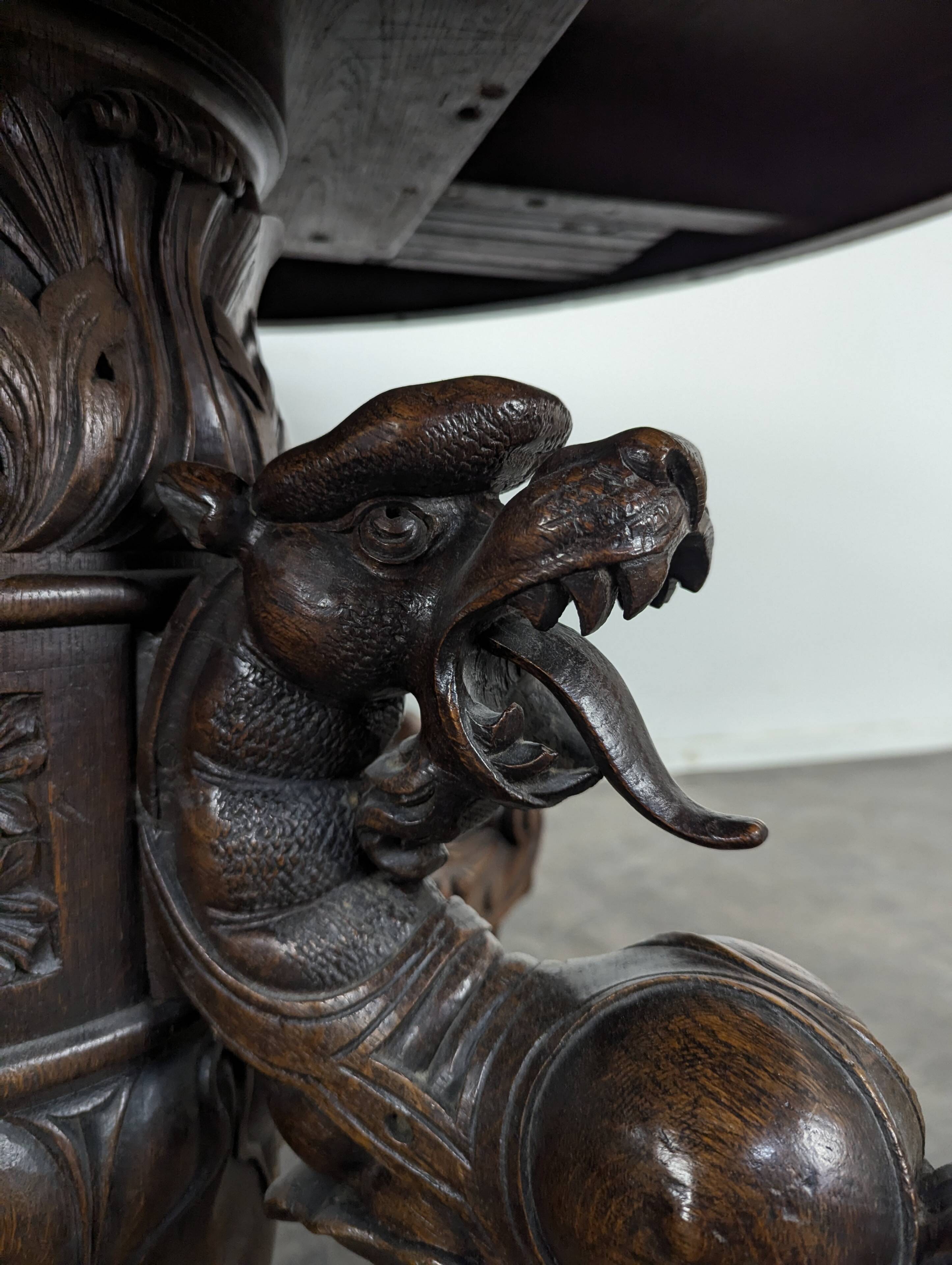 Renaissance-style gueridon with dragon heads in oak