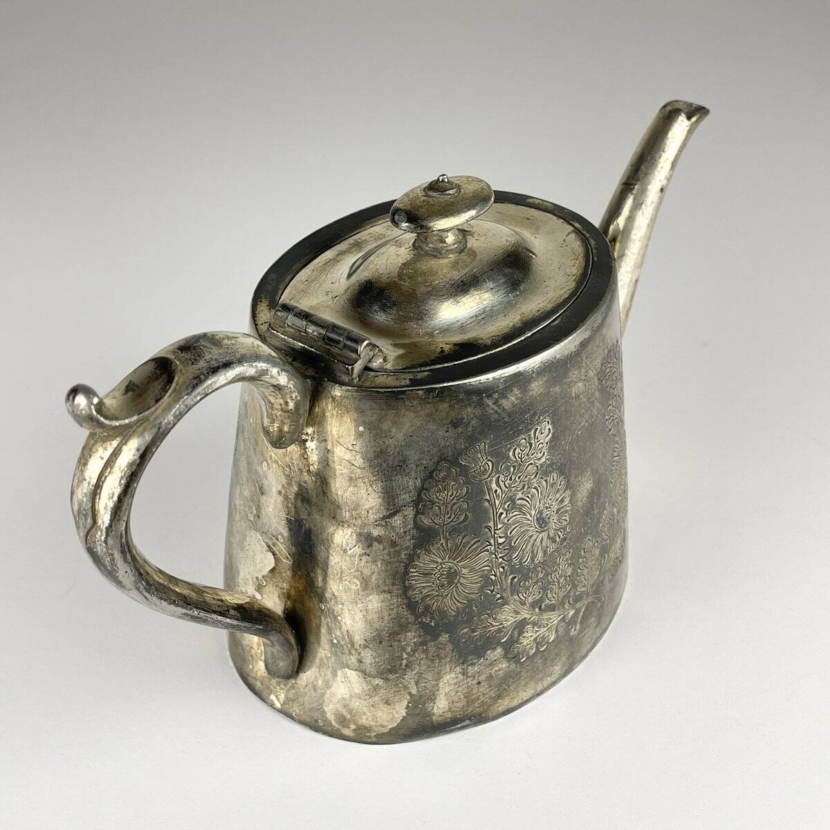 Antique silver-plated teapot from Sheffield, England, 1890-1910.