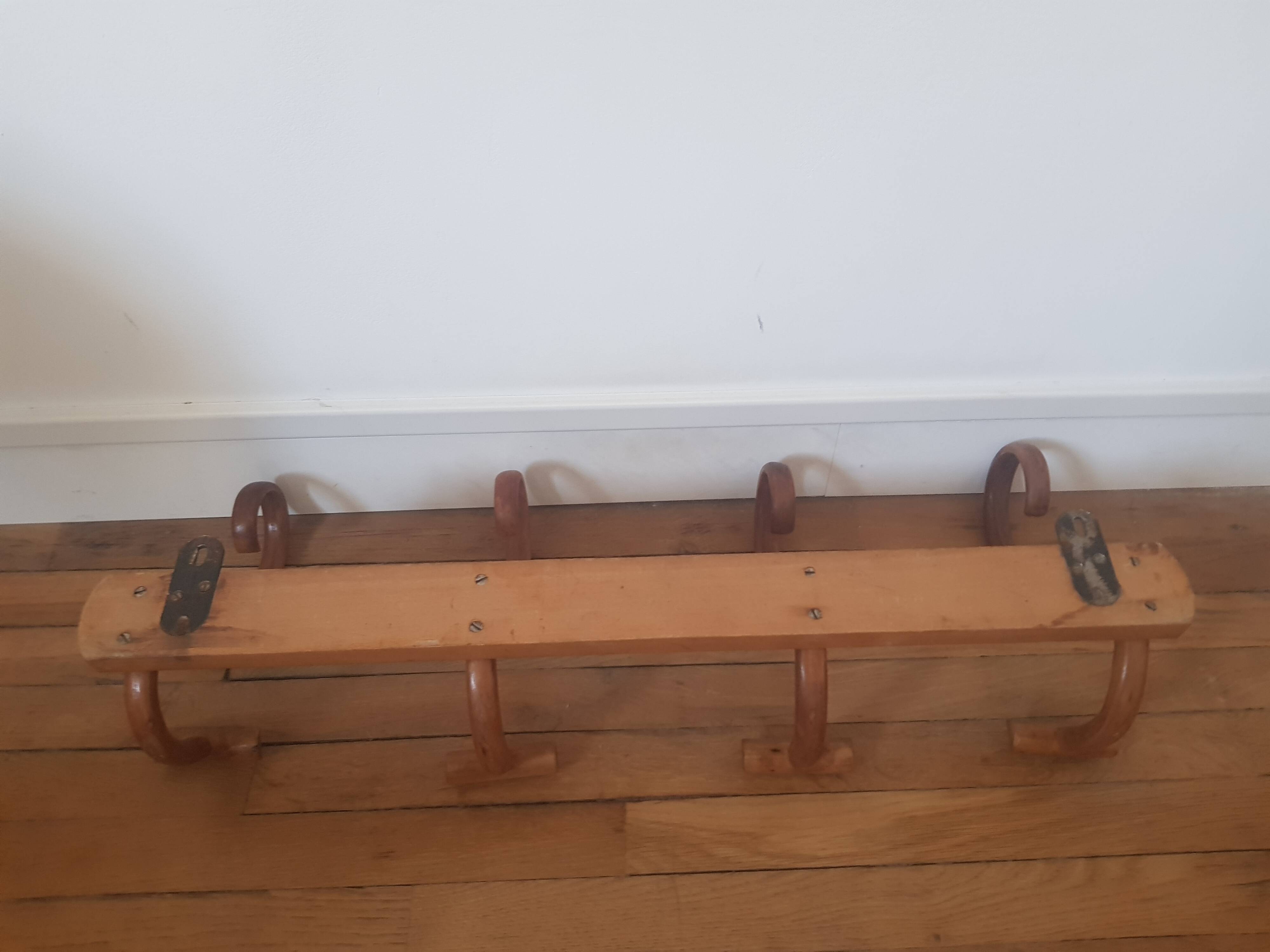 Wooden wall coat rack