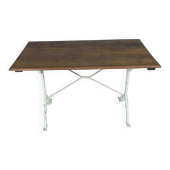 Bistro table with oak top on cast iron frame