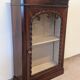 Mahogany display cabinet from the late 19th century, for standing or wall mounting.
