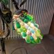 Bronze table lamp and Murano glass grape clusters.