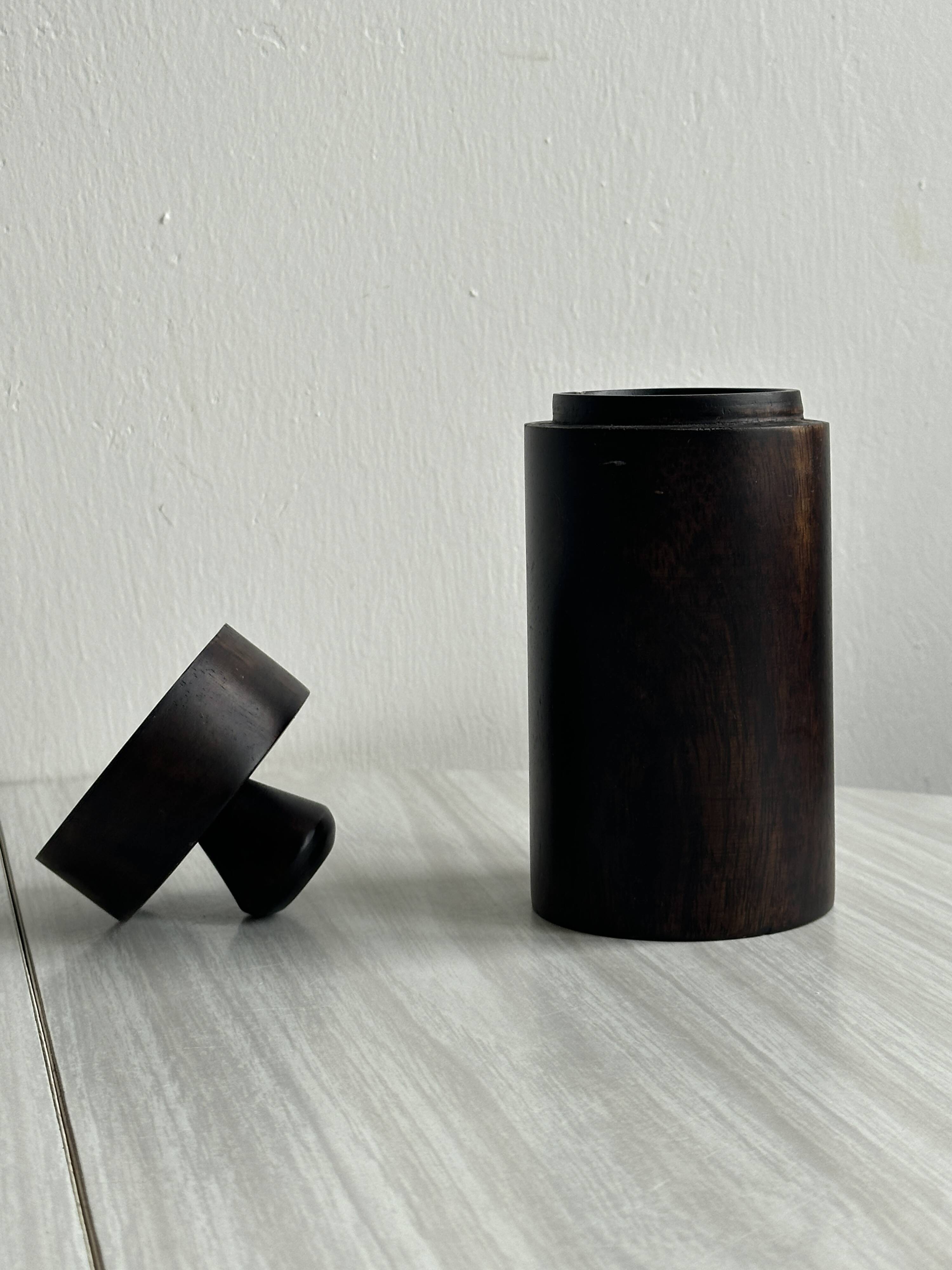 Old brutalist style wooden pot.