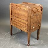 EAGLE in Paris. Wooden archive cabinet opening with two drawers and a curtain.