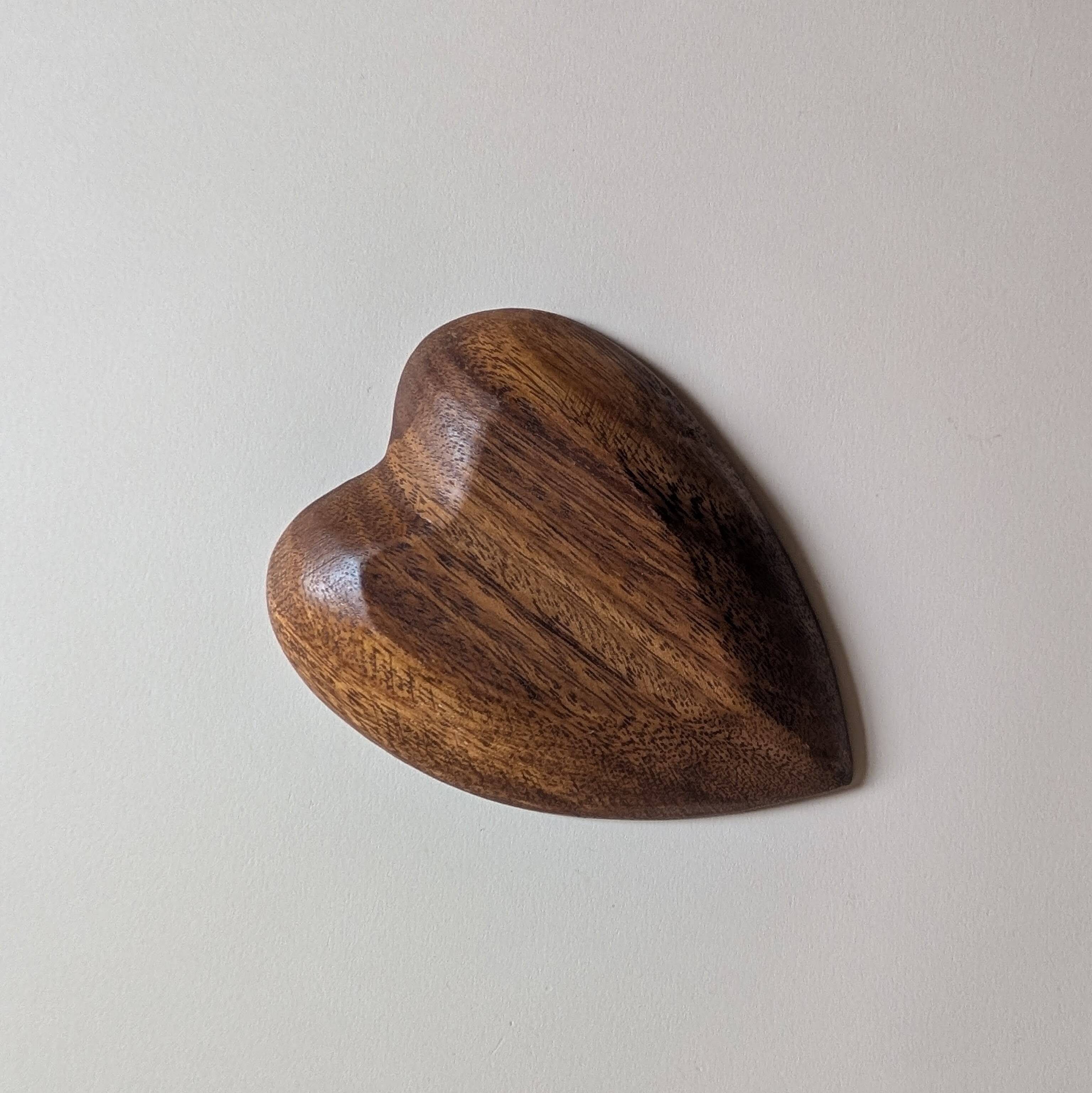 Heart-shaped pocket emptier