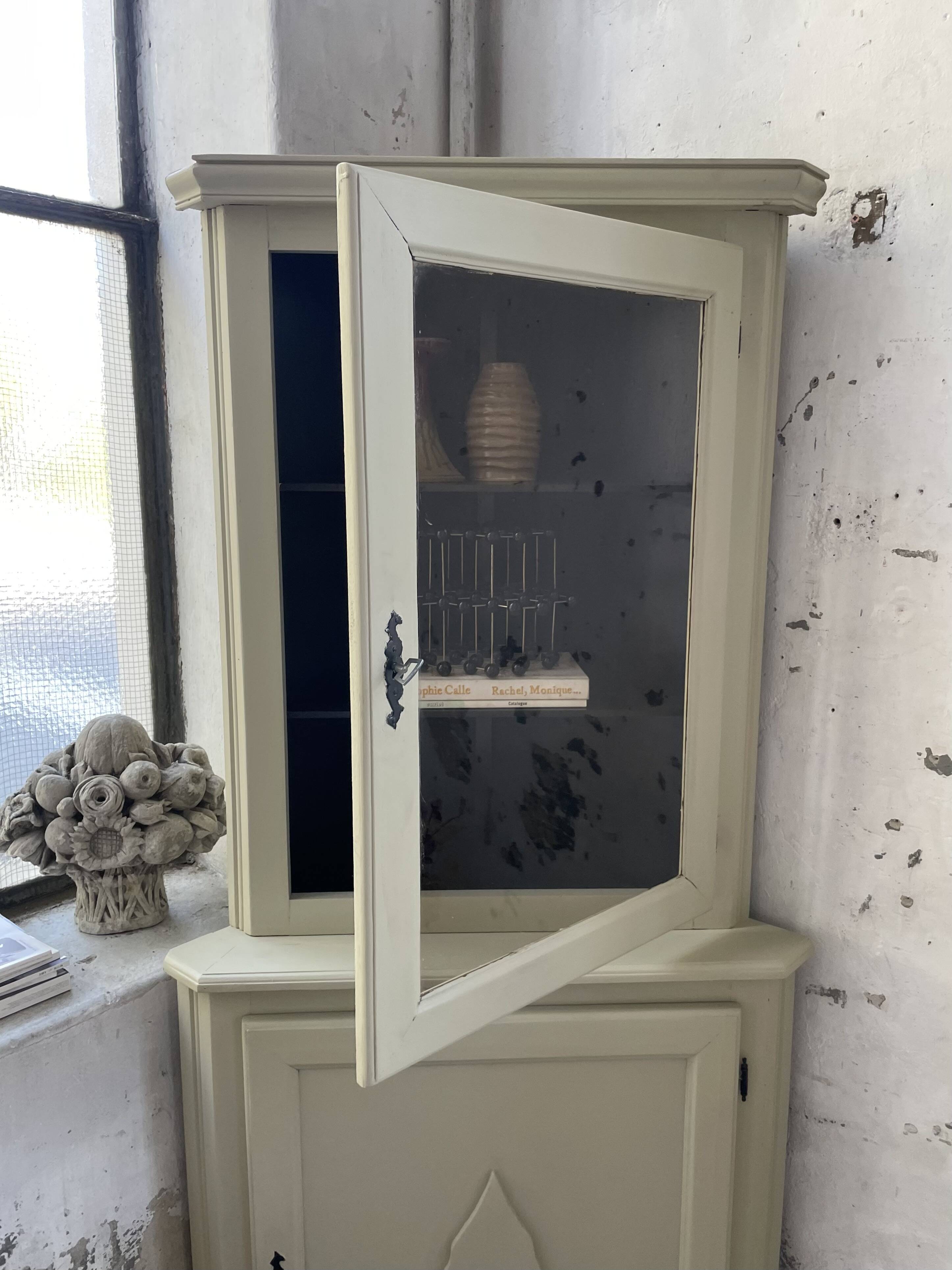 Corner display cabinet from the 1950s