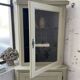 Corner display cabinet from the 1950s