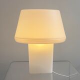 Minimalistic white plastic table lamp