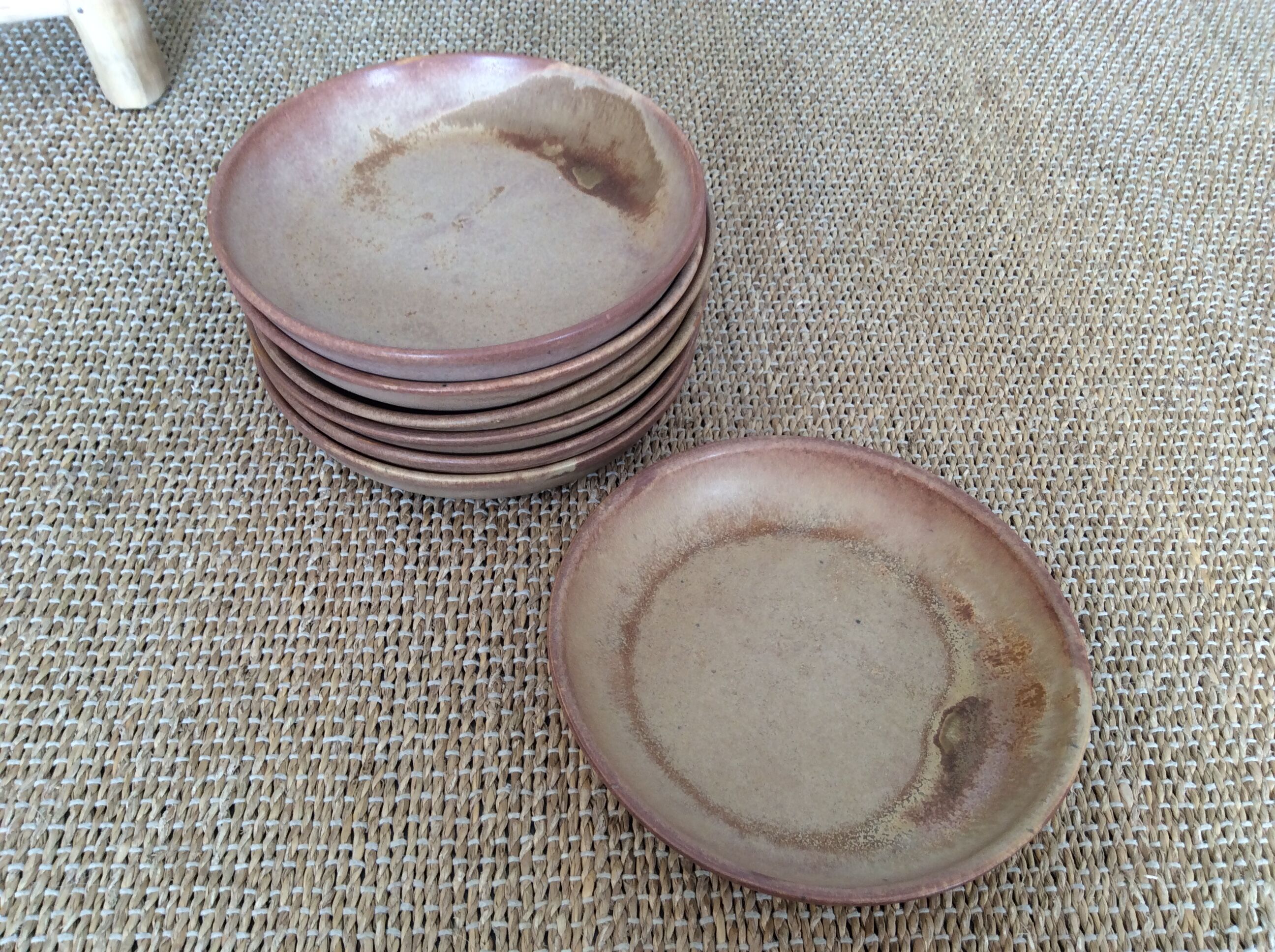 7 hollow stoneware plates