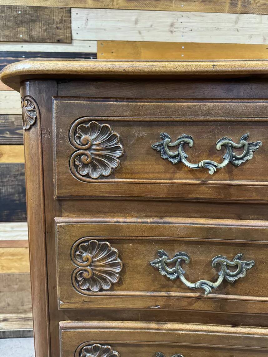 Curved commode in Louis XV style made of walnut.