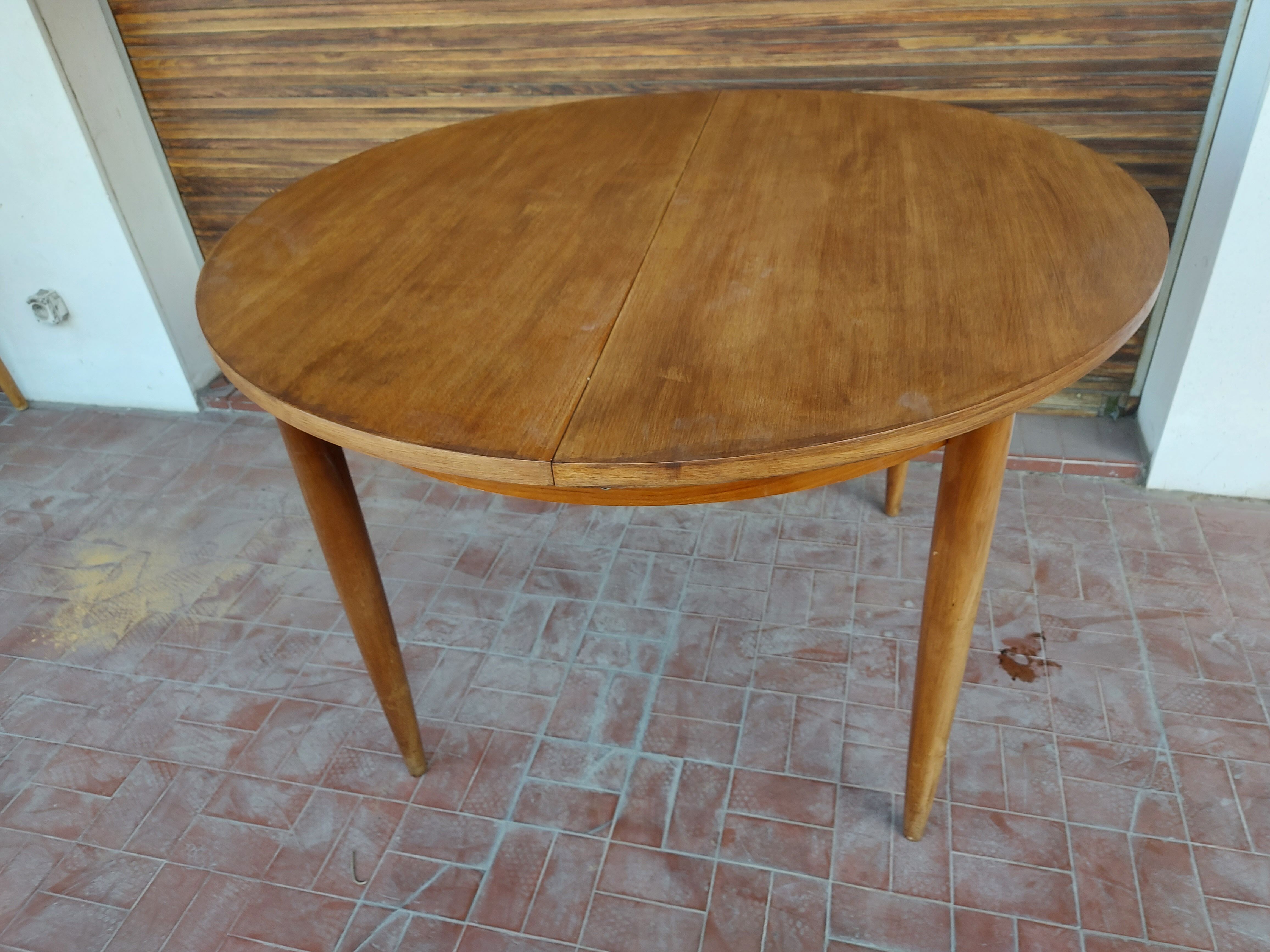 Scandinavian design teak table with extension cord