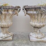 Pair of planter vases decorated with faces in reconstituted stone 1950s