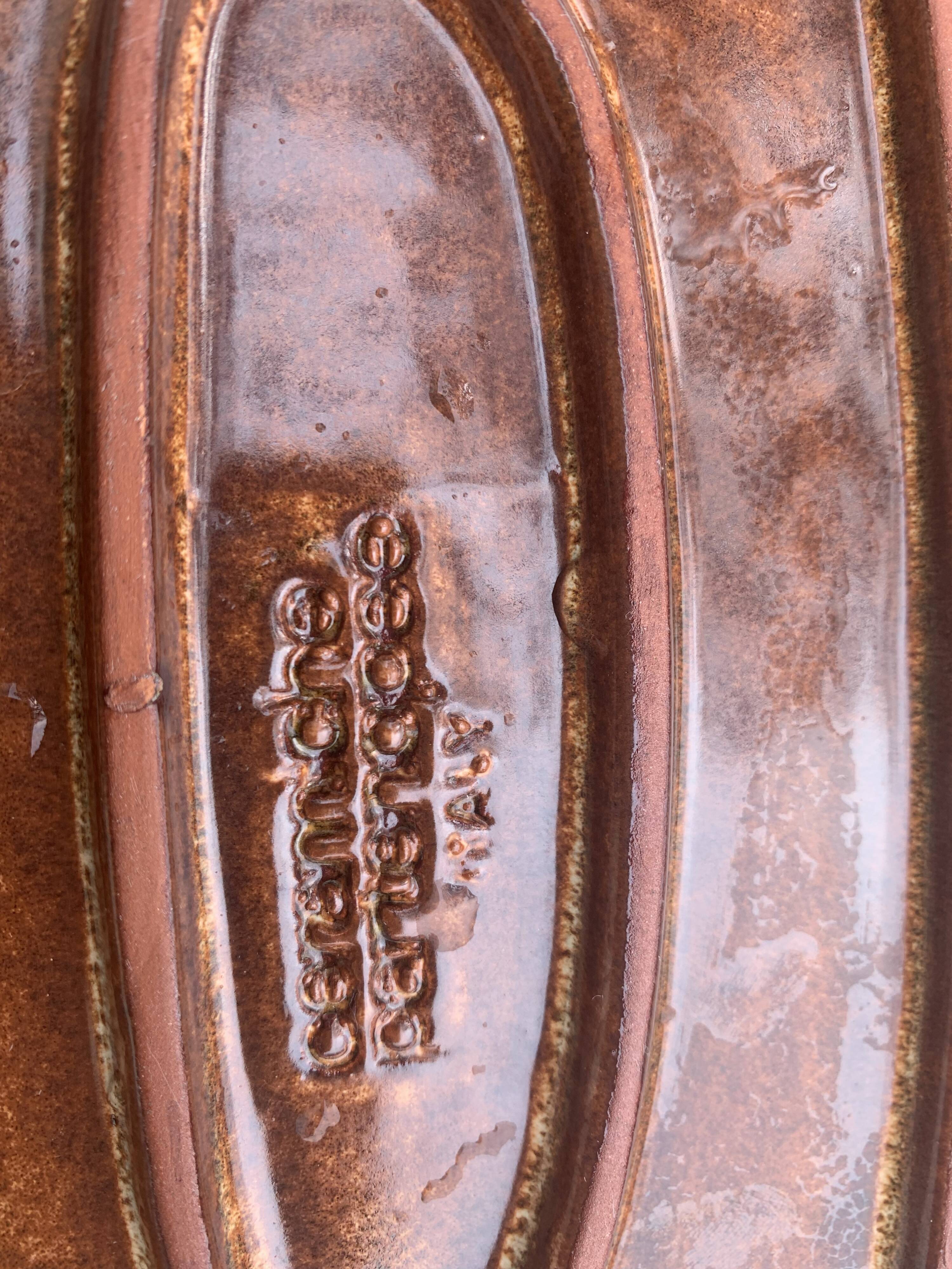 Slurry glazed ceramic dish in the shape of vintage fish